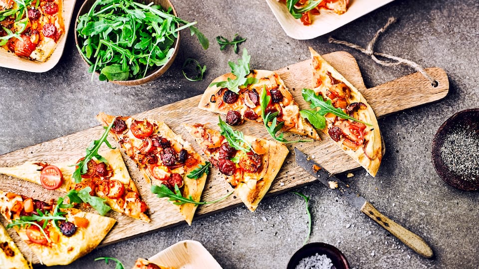 Tomaten-Pizza mit Rucola Tomaten-Pizza mit Rucola